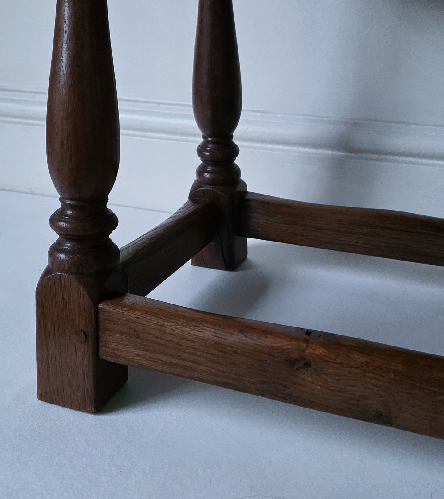 The Joanne Antique Oak Twist & Fold Swivel Side Table