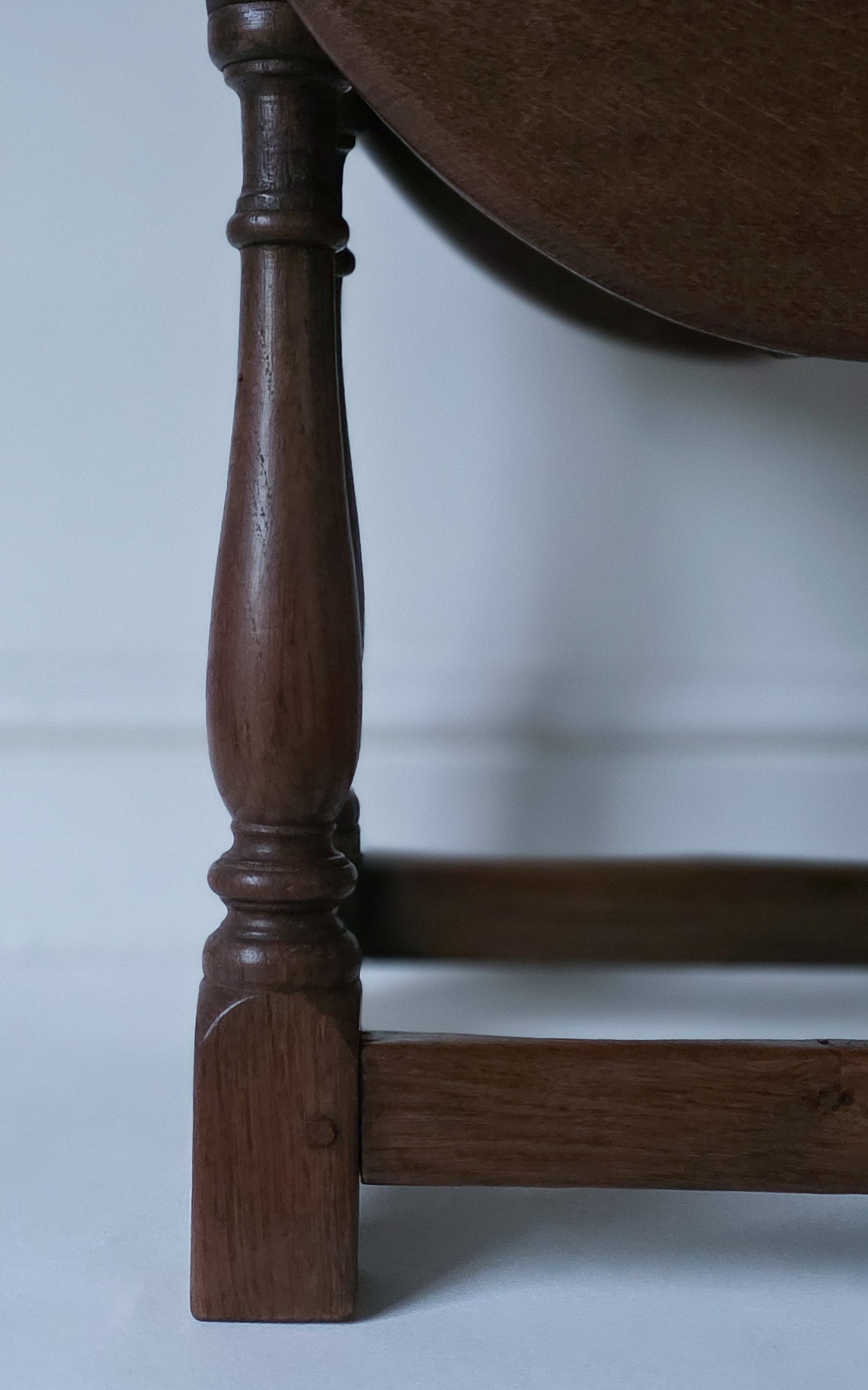 The Joanne Antique Oak Twist & Fold Swivel Side Table