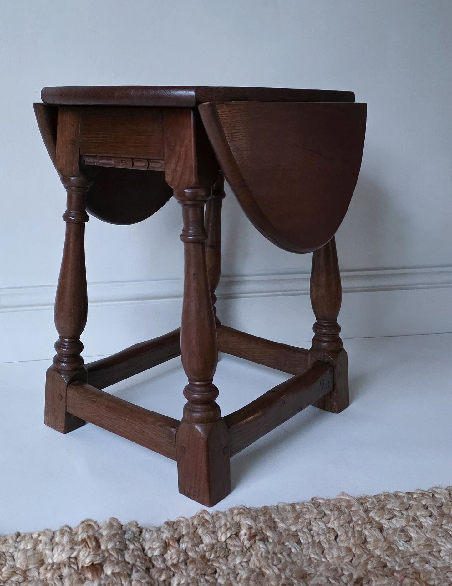 The Joanne Antique Oak Twist & Fold Swivel Side Table