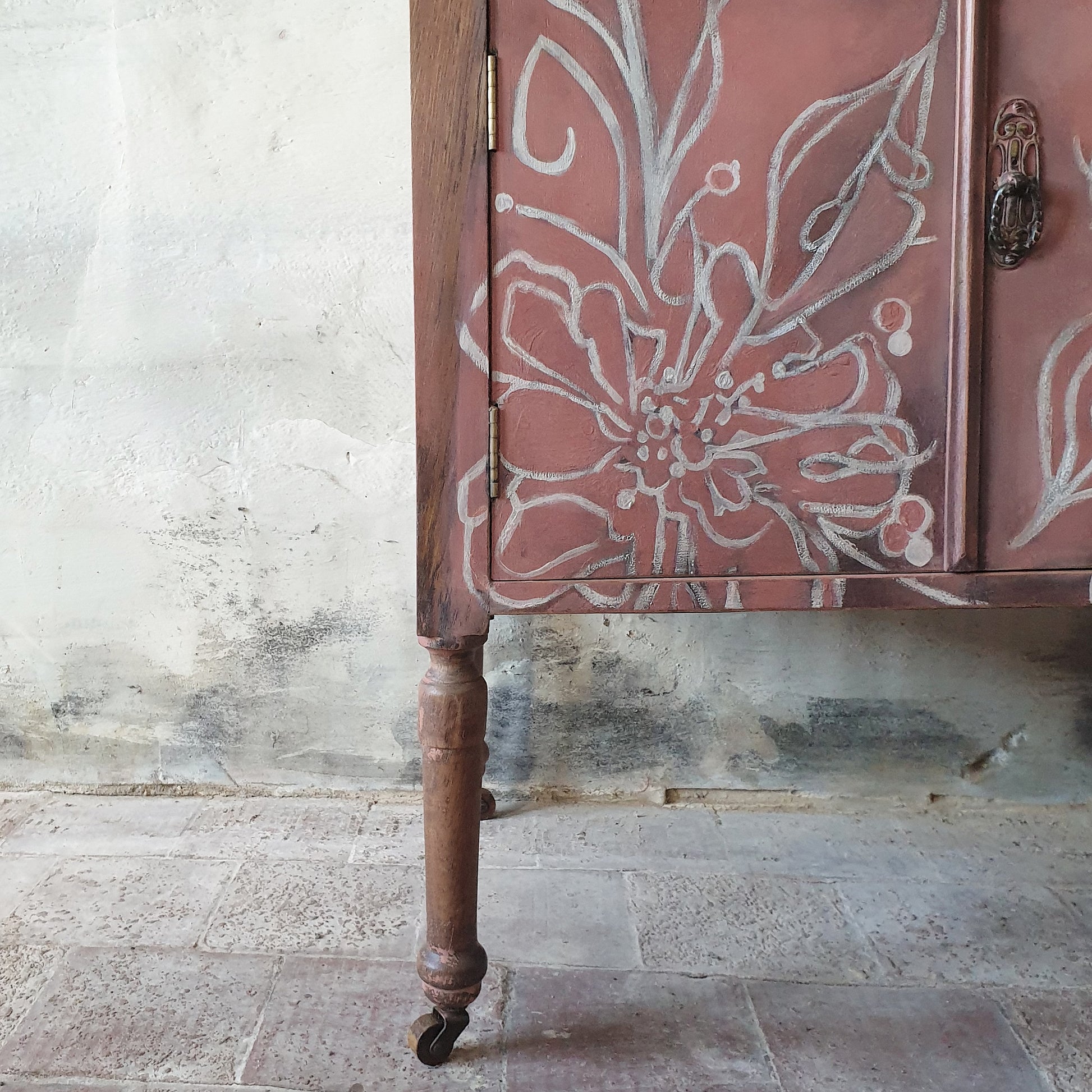 1930’s Oak Cabinet featuring a hand painted freeform floral design in white.