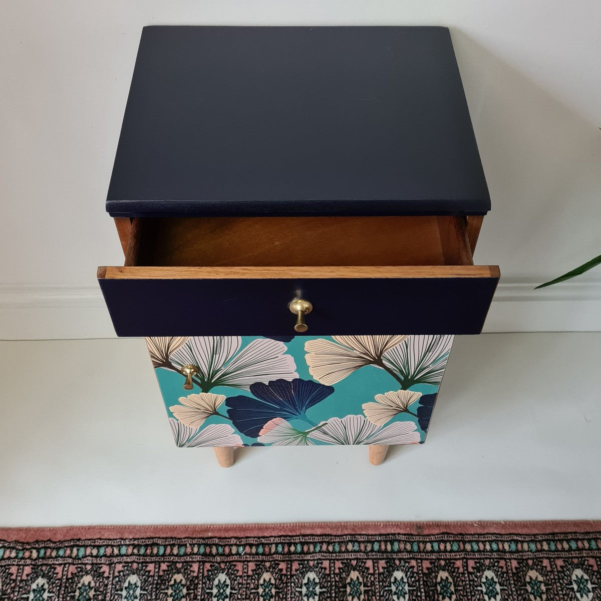 Mid Century Cabinet with original handles made by British Maker Lebus and refinished with inky blue and ginkgo decoupage.